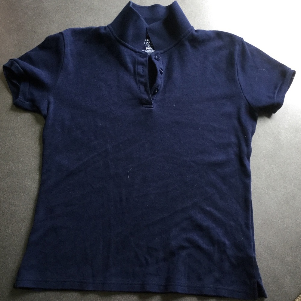 Girls navy blue uniform shirt.